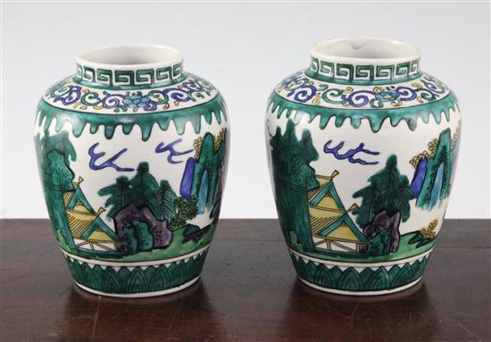 A pair of Japanese green Kutani ovoid jars, late 19th century, 13cm